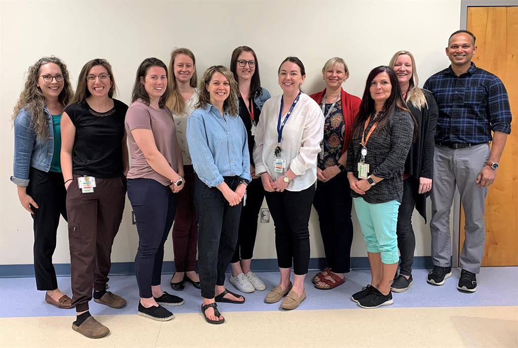 Members of the Community Stroke Rehabilitation team pose for a group photo